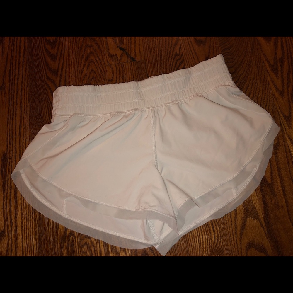 white Lululemon unlined shorts size 4